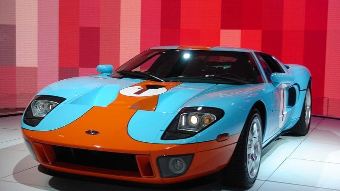Interesting, color-rich image of a 2006 Ford GT Heritage Edition.