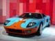 Interesting, color-rich image of a 2006 Ford GT Heritage Edition.