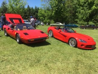 Ferrari 308 and SRT Viper on show field.