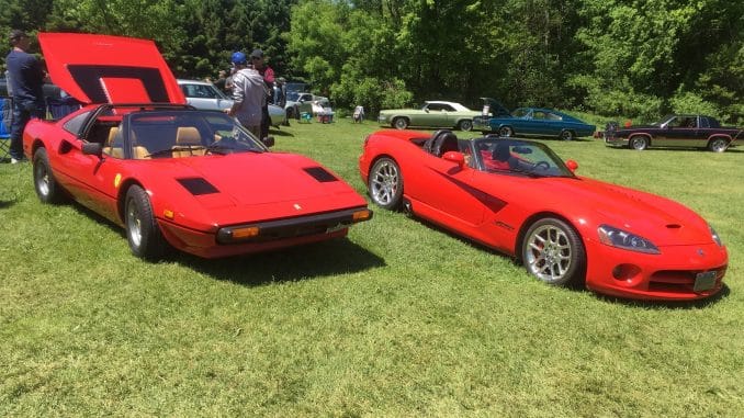 Ferrari 308 and SRT Viper on show field.